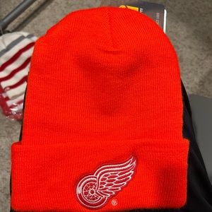 Safety orange Carhartt Red Wings winter hat